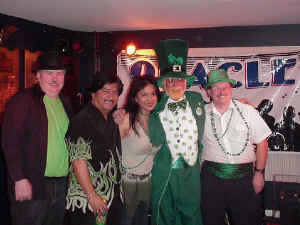 The band poses with the Legion's resident Leprechaun. Click for enlarged view.