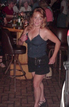 Click for enlarged view. She's not shy, but she did ask what we were going to do with the photo. Now she knows!